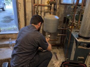 Testing boiler expansion tank pressure by 7th Degree Heating and Air