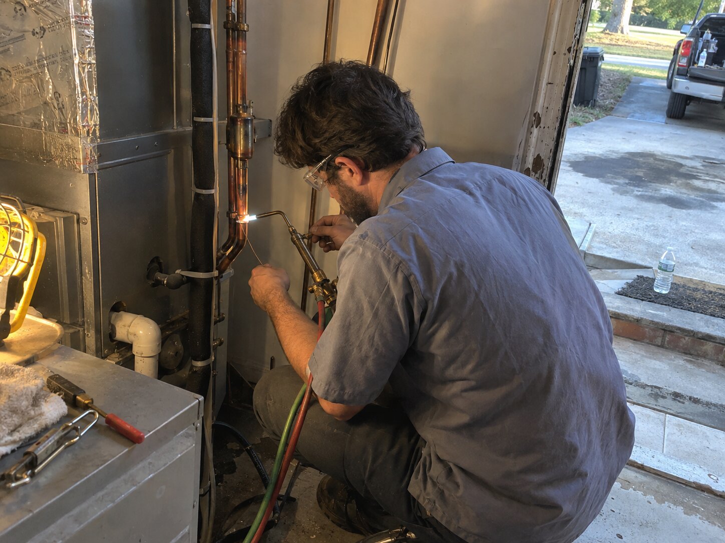 Brazing refrigerant lines during an AC installation by 7th Degree Heating and Air