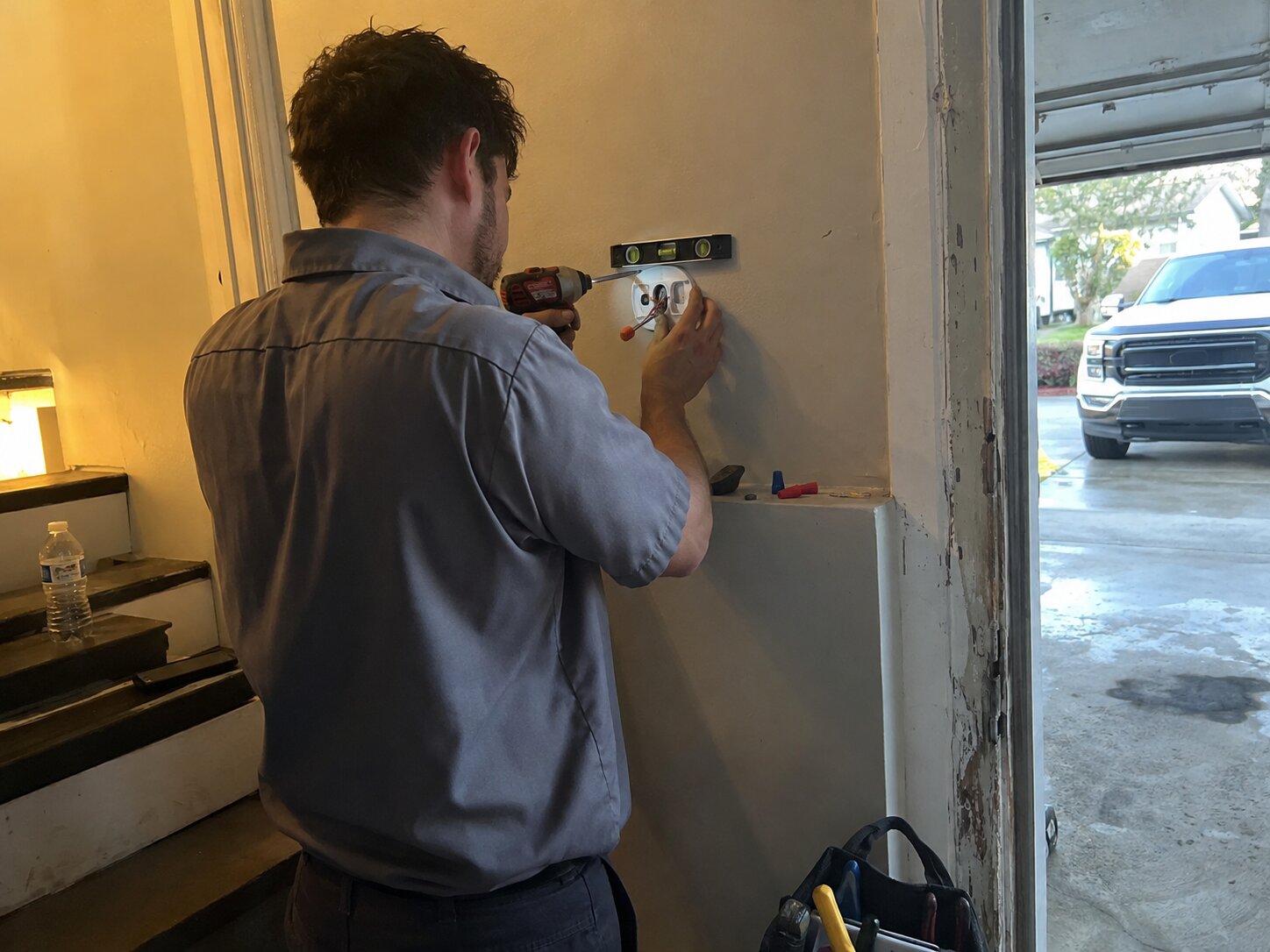 Mounting a new smart thermostat base to a wall in Installation by 7th Degree Heating and Air
